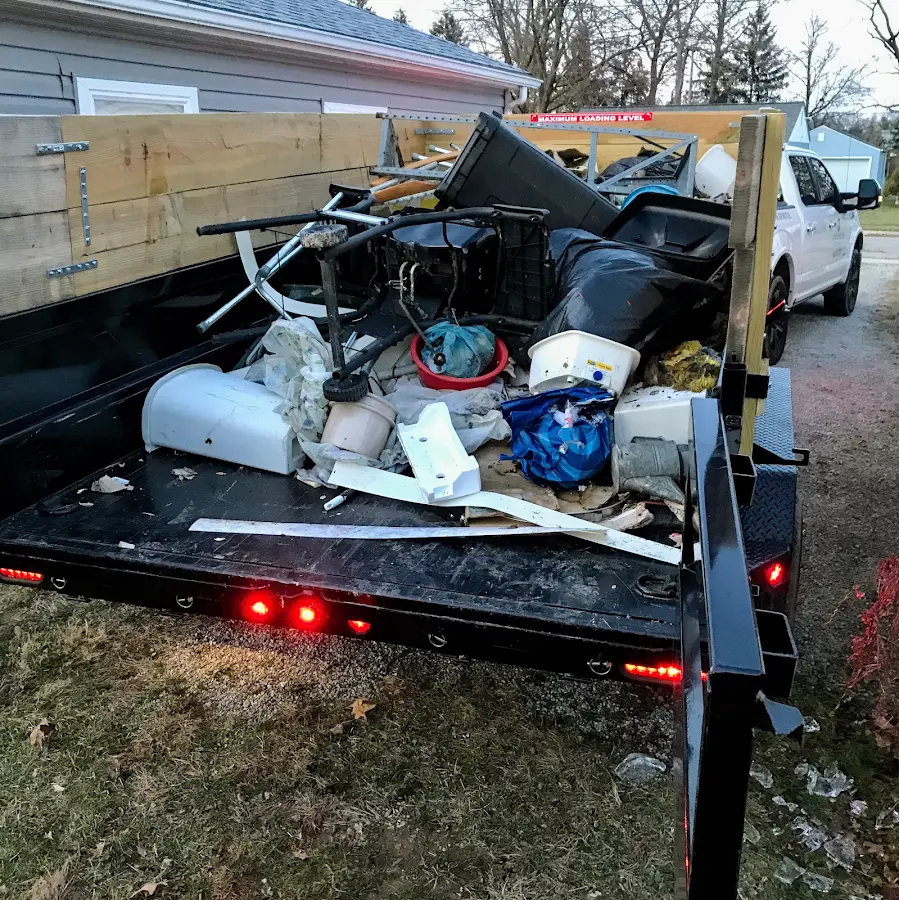 Roll-off dumpster delivered to a residential driveway in Thatcher
