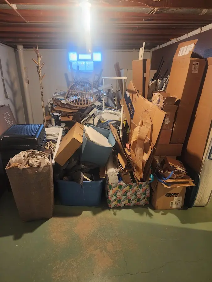 Roll-off dumpster container at job site for 2 Yard Dumpster Rental in Thatcher